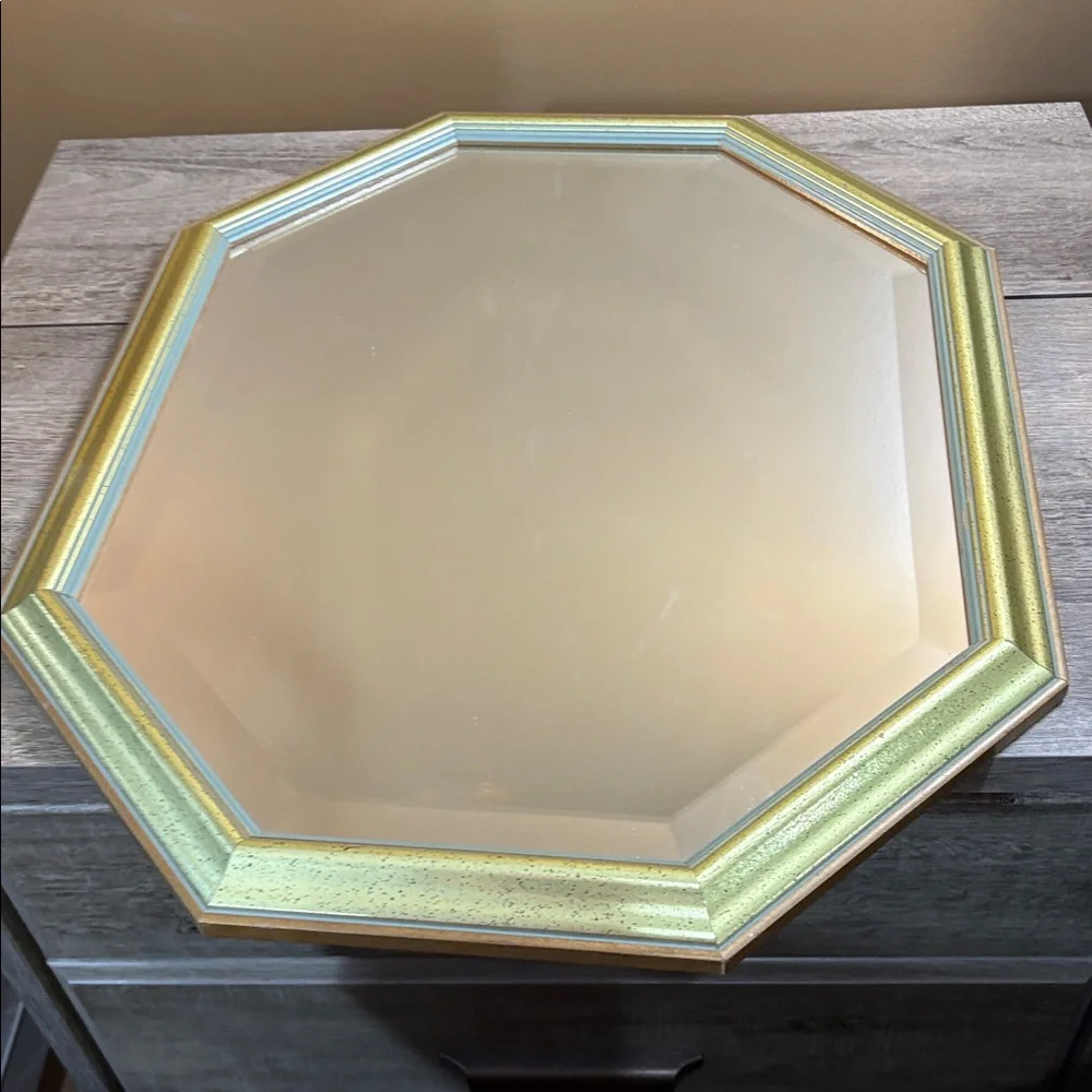 A mid century modern style octagonal mirror vertical or horizontal orientation